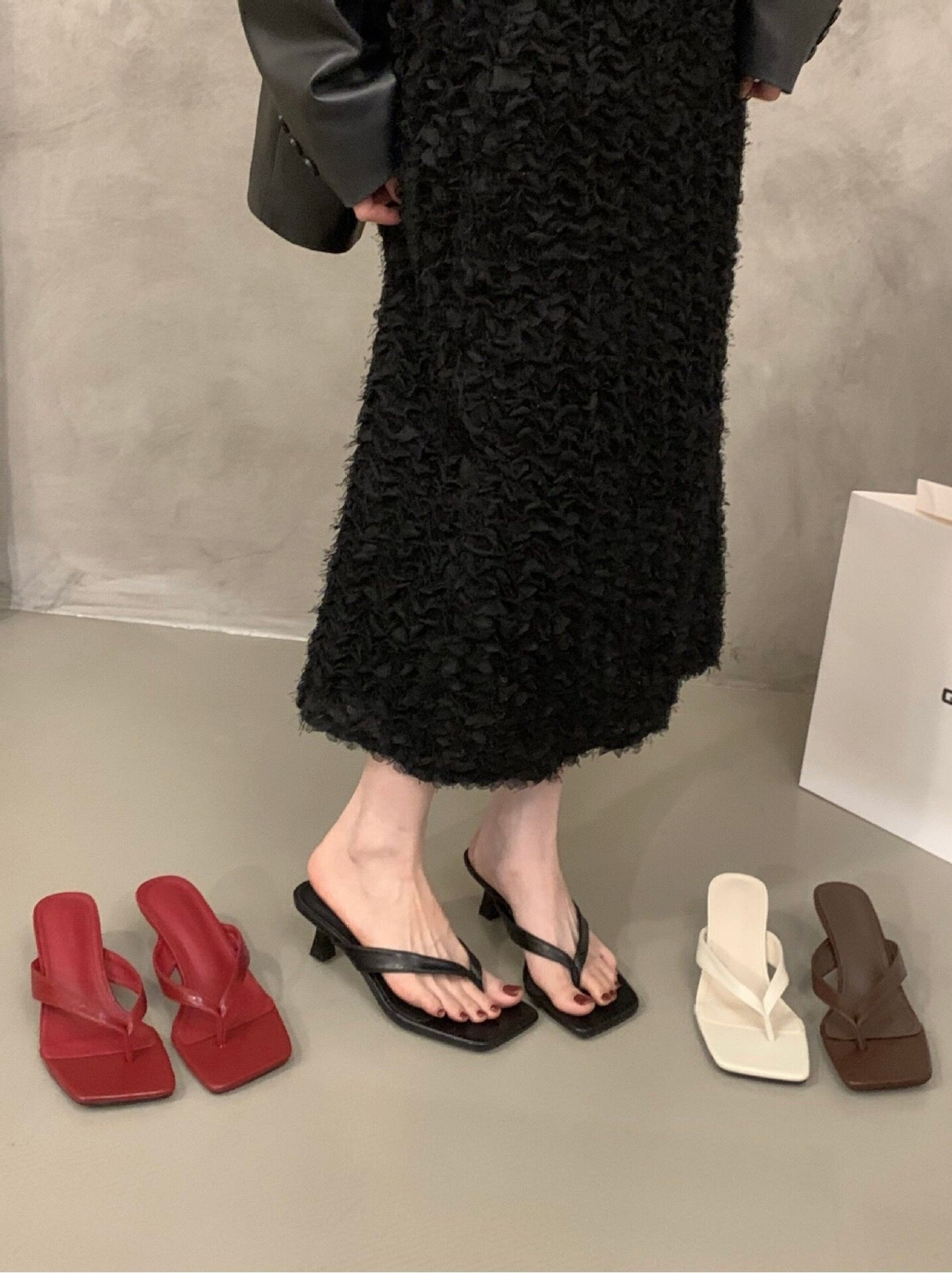 Camille sandal color selection with black sandals on foot