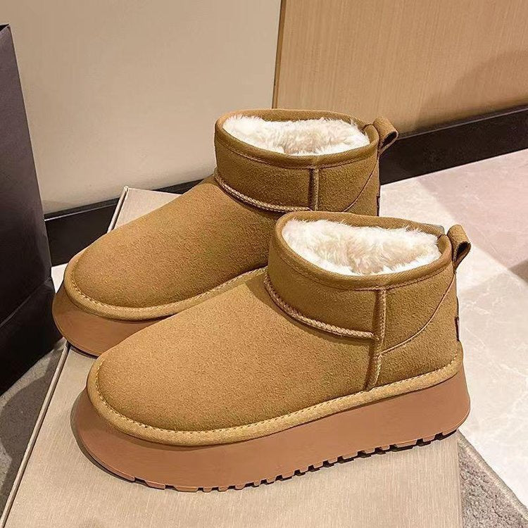 Chestnut faux-fur-lined platform snow boots pair