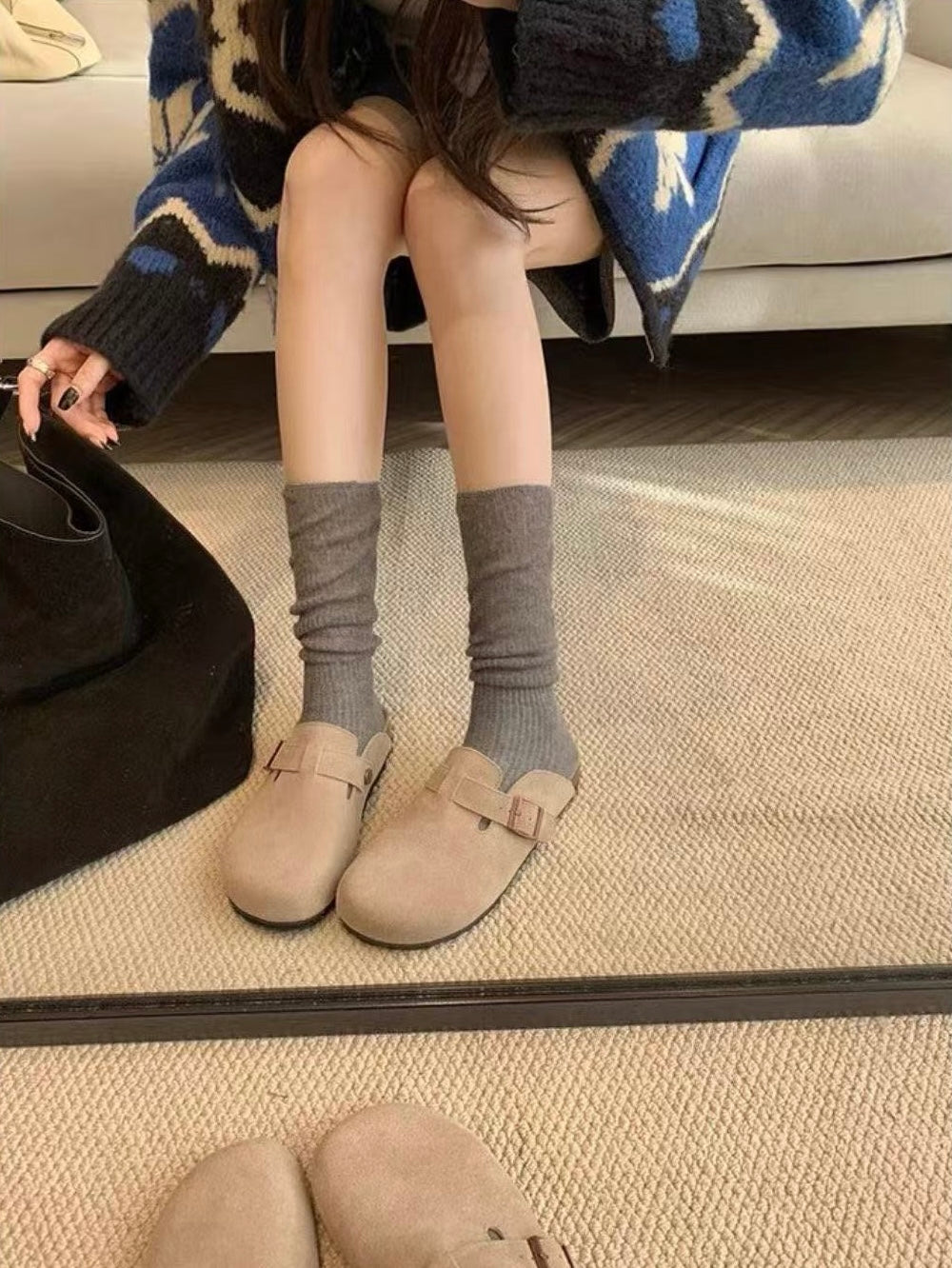 Maren Leather Buckle Mules in Dark Taupe, front view with socks