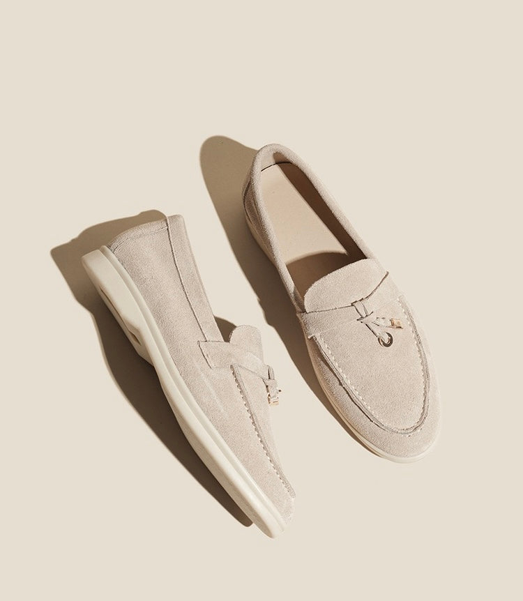 Nora Suede Penny Loafers in Sand Apricot, standard angled pair