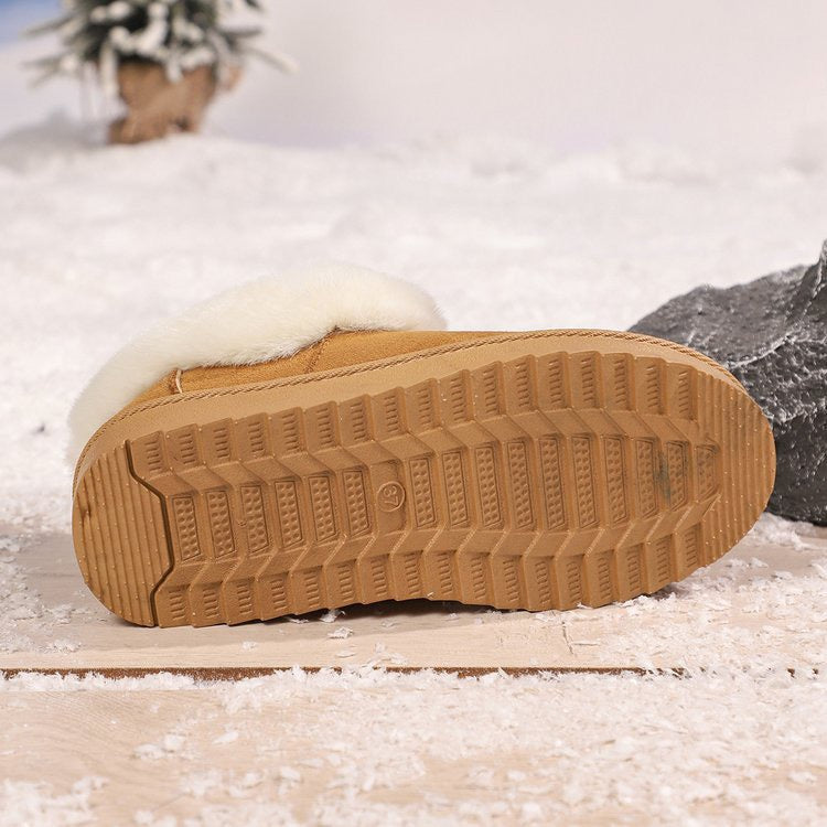 Brown slip-on snow boots rubber outsole detail