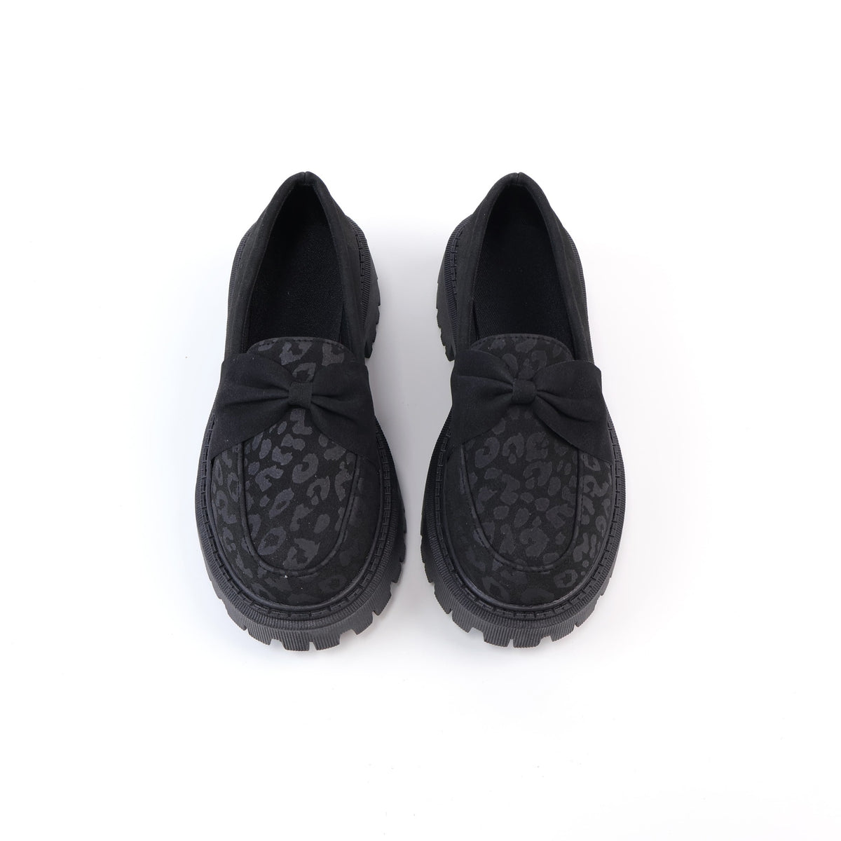 Black leopard-print bow platform loafers top view