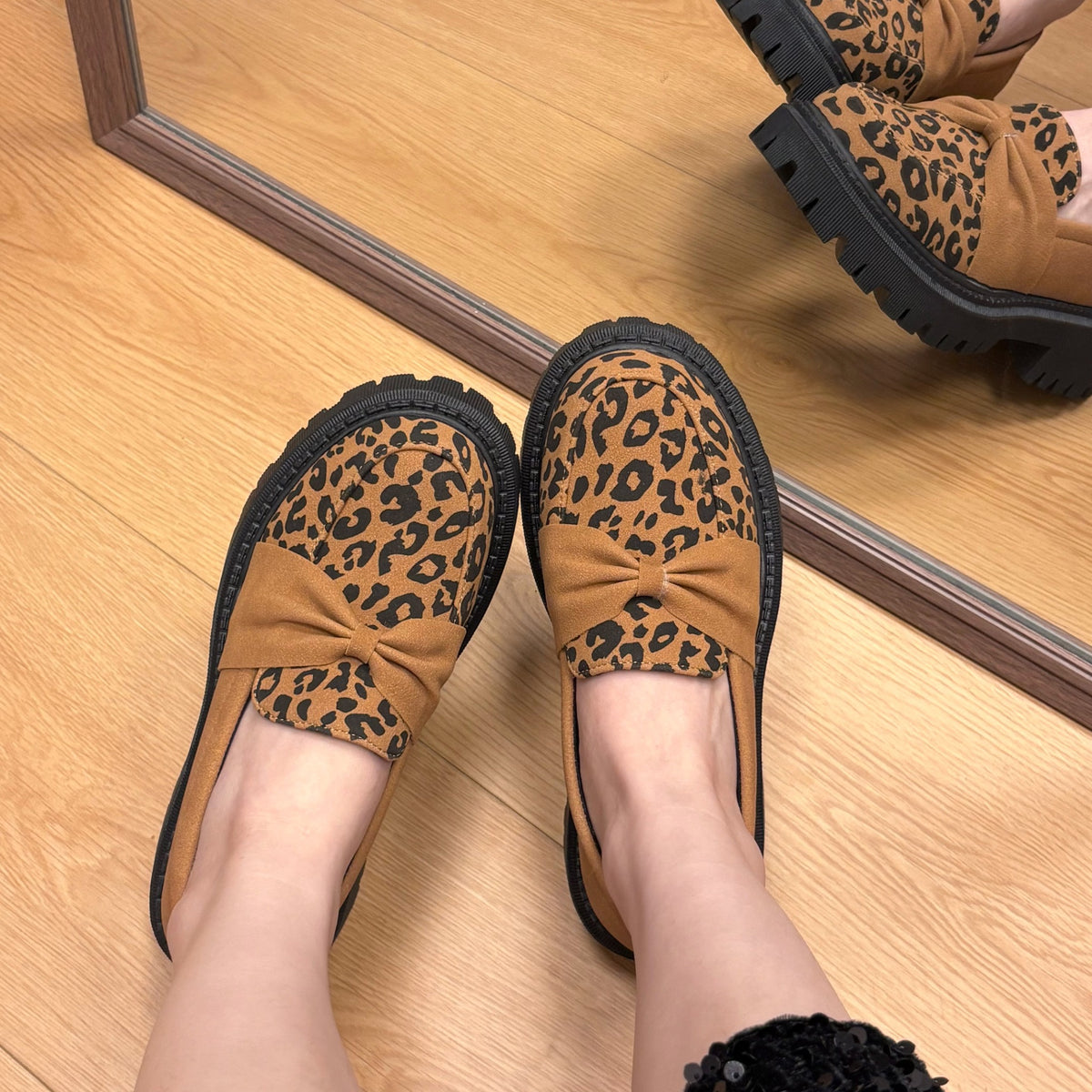 Brown leopard-print bow platform loafers mirror styling