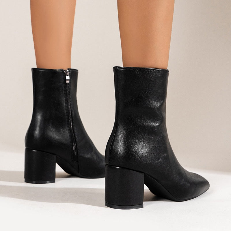 Sloane black ankle boots, rear view
