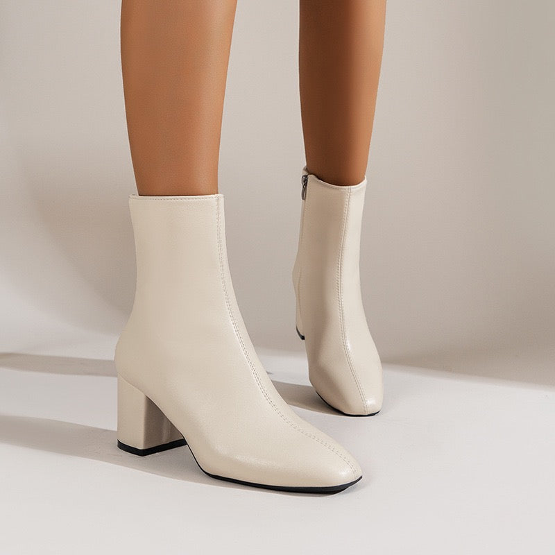 Sloane ivory ankle boots, front lifestyle view