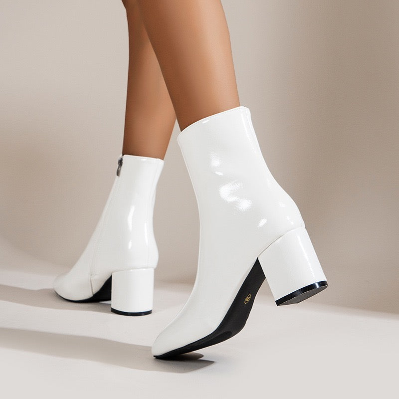 Sloane white ankle boots, front view
